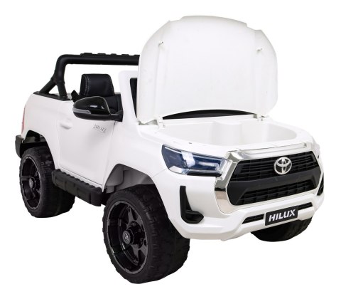 Toyota Hilux na akumulator dla dzieci Biały Pickup + Napęd 4x4 + Pilot + 2 bagażniki Toyota Hilux na akumulator dla dzieci Biały Pickup + Napęd 4x4 + Pilot + 2 bagażniki